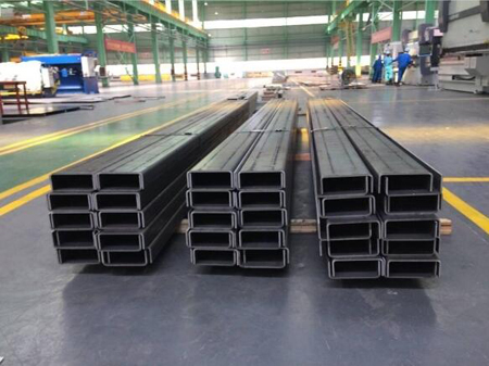 What role does manganese play in steel properties